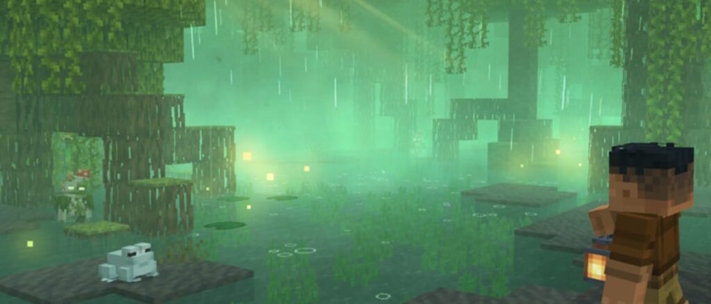 Minecraft swamp scene with misty green light, vines, frogs on lily pads, and a player holding a lantern on the right.