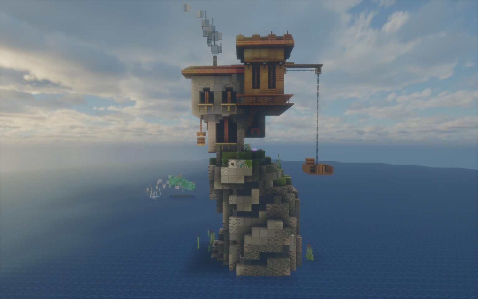 海岸沿いの岩の上の家