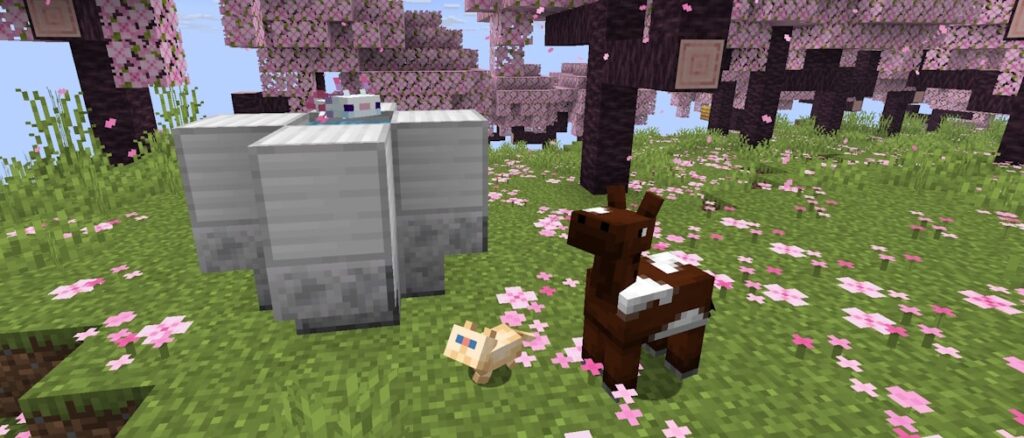 Minecraft 26.1 Pre-Release 2 | Minecraft A baby axolotl in a giant water bucket, a baby horse, and a baby cat are standing in a Cherry Grove