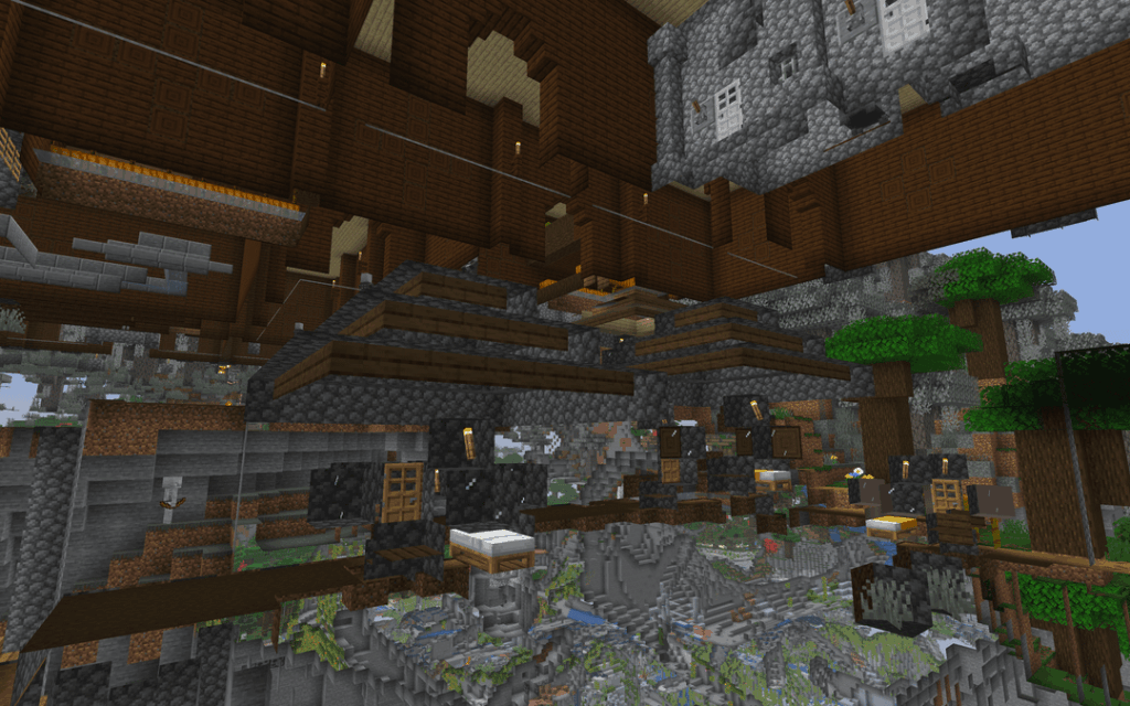 森の屋敷（のようなもの）の中に生成された村。シードは 7073245350281013044 (Java 1.21.11)、-1919, 150, 1424 にあります。