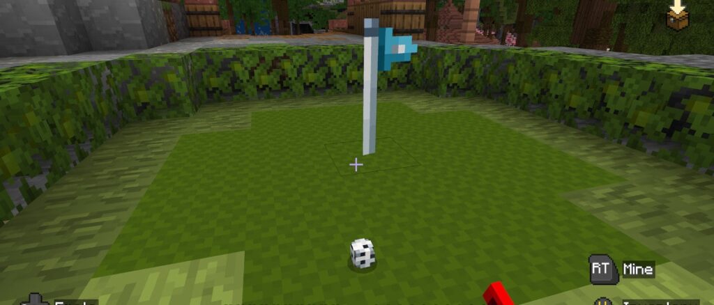 LETS PLAY Mini Golf Resort Minecraft gameplay scene showing a small blue flag on a pole in a grassy arena A golf ball rests on the ground as the player holds a red golf club aimed toward the flag
