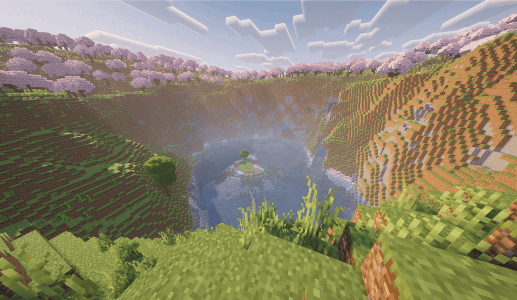 川と桜の木立に囲まれた一本の木の島