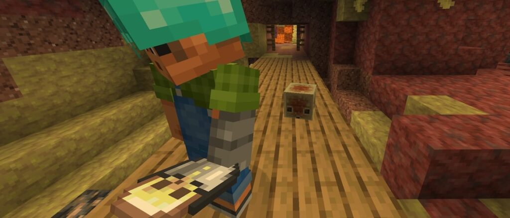 Sunny in a Sulfur Cave mineshaft holding a bucket with a Sulfur Cube while being watched from behind by a Sulfur Cube