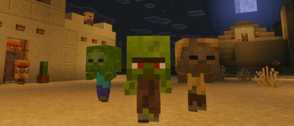 A baby zombie, baby zombie villager, and baby husk walking through a village