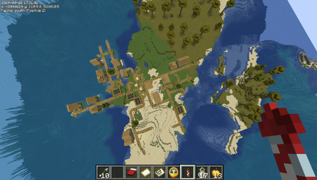 50万ブロックを飛んで、ついに究極のマルチバイオームの村を見つけました。平原、砂漠、サバンナにまたがっています。