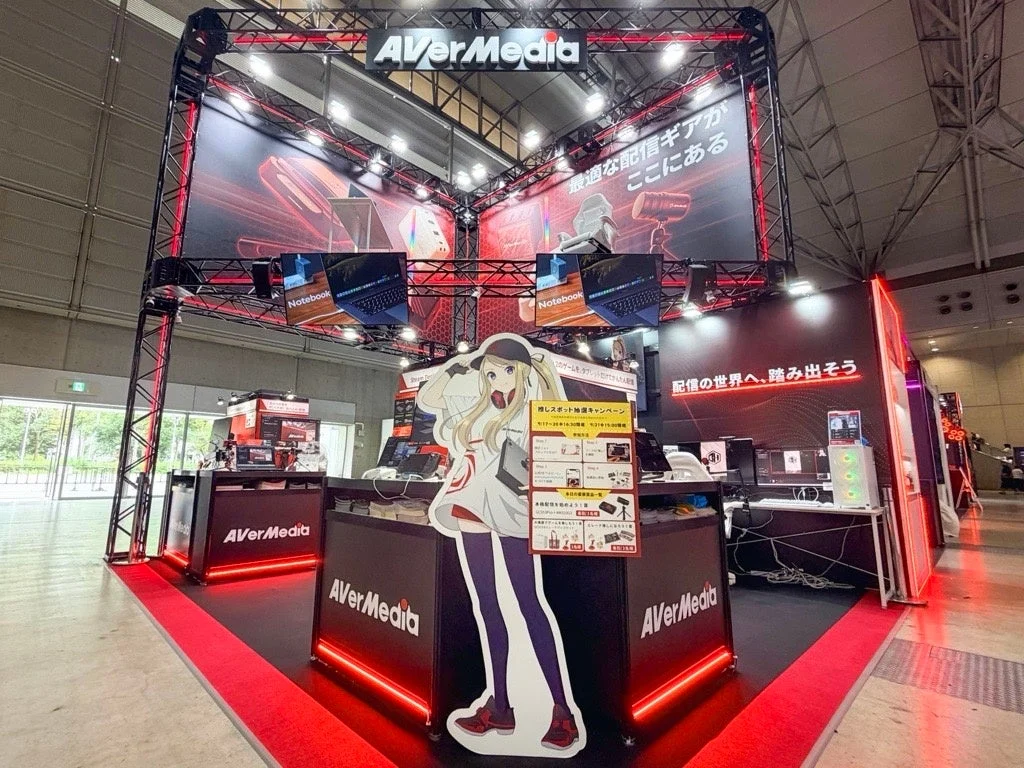 東京ゲームショウ2026にAVerMediaが出展、配信機材の体験展示やプロゲーマー対戦イベントを実施 | AppBank AVerMediaブース全景、ELENAスタンディと「配信の世界へ、踏み出そう」の看板